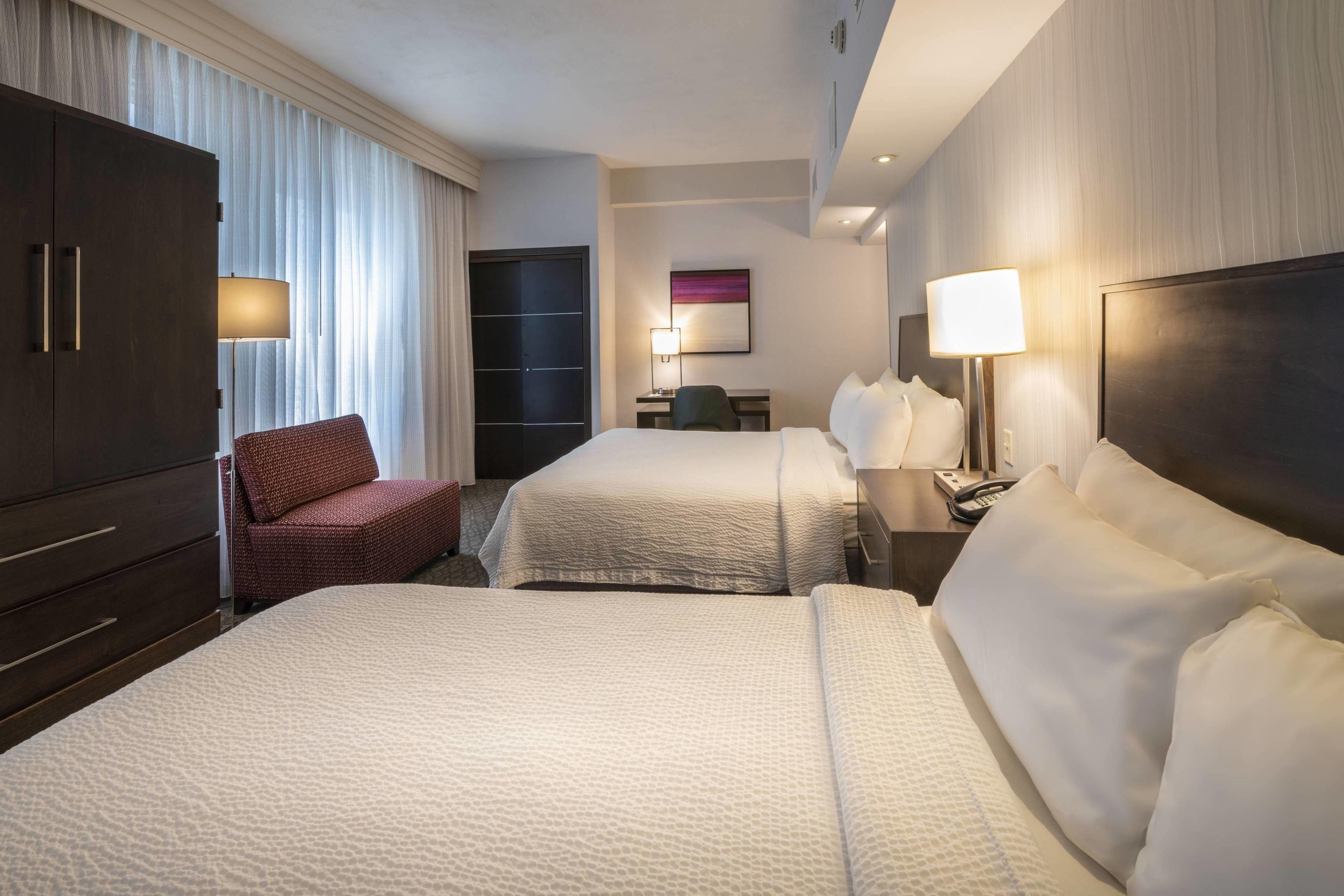 Two-Bedroom Suite One King Bed Two Queen Beds Sofa Bed